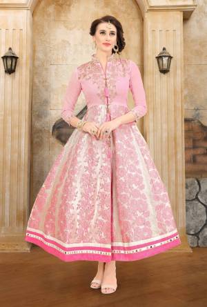 Celebrate This Festive Season Wearing This Semi-Stitched Gown Cum Kurti In Baby Pink Color Fabricated On Art Silk And Jacquard Silk Beautified With Jari And Thread Embroidery. Get This Tailored As Per Your Desired Fit And Comfort. 