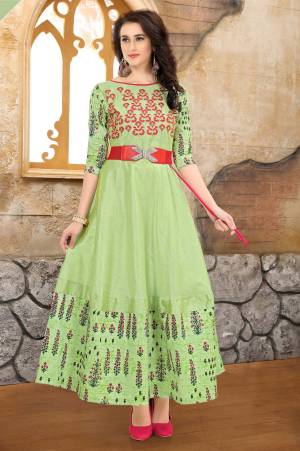 Pretty Readymade Kurti Is Here With Very Pretty Light Green color Fabricated On Art Silk. It Is Beautified With Prints And Thread Work. Get This Readymade Kurti Now.
