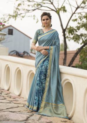 Drape This Beautiful Saree In Pretty Blue Color Paired With Blue Colored Blouse. This Saree And Blouse Are Fabricated On Cotton Art Silk Beautified With Prints. Drape This And You Will Definitely Earn Lots Of Compliments From Onlookers.