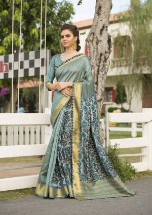 Prettiest Shade Of Blue Is Here With This Saree In Baby Blue Color Paired With Baby Blue Colored Blouse. This Saree And Blouse Are Fabricated On Cotton Art Silk Beautified With Prints. It Is Light Weight, Easy To Drape And Carry All Day Long.