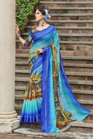 Attract All wearing This Saree In Bright Shade Of Blue Colored Saree Paired With Blue Colored Blouse. This Saree And Blouse Are Fabricated On Chanderi Silk  Beautified With Prints All Over It. 
