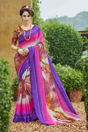 Beautiful Combination Is Here With This Saree In Purple And Pink Color Paired With Multi Colored Blouse. This Saree And Blouse Are Fabricated On Chamderi Silk Beautified With Bold Prints. Buy Now.