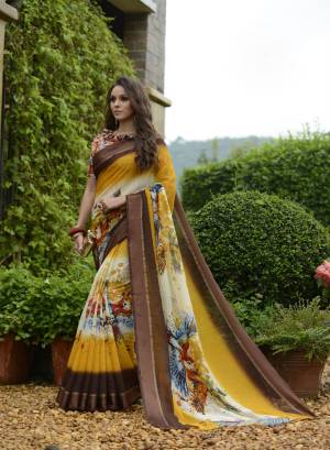 Celebrate This Festive Season Wearing This Saree In Yellow & Brown Color Paired With Multi  Colored Blouse. This Saree And Blouse Are Fabricated On Chanderi Silk With Multi Colored Prints.