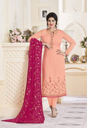 A Must Have Color In Every Womens Wardrobe, Grab This Beautiful Designer Peach Colored Straight Cut Suit Paired With Peach Colored Bottom And Contrasting Pink Colored Dupatta. Its Top Is Fabricated On Georgette Paired With Santoon Bottom And Georgette Dupatta. Its All Three Fabrics are Light Weight And Easy To Aarry All Day Long. 