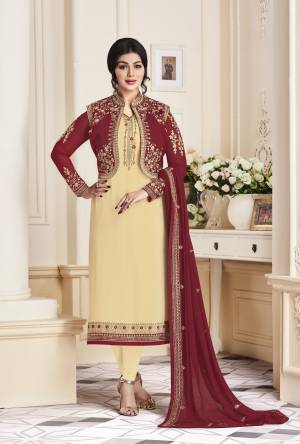 Flaunt Your Rich And Unique Taste Wearing This Designer Staright Cut Suit In Cream Colored Top Paired With Cream Colored Bottom And Maroon Colored Dupatta. Its Top Is Fabricated On Georgette Paired With Santoon Bottom And Georgette Dupatta. Buy This Semi-Stitched Suit Now.