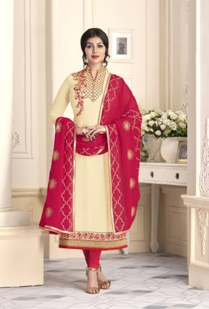 Grab This Beautiful Designer Straight Cut Suit In Cream Colored Top Paired With Contrasting Dark Pink Colored Bottom And Dupatta. Its Top Is Fabricated On Georgette Paired With Santoon bottom And Georgette Dupatta. Buy This Semi-Stitched Suit Now.