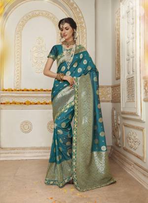 Look Beautiful Wearing This Turquoise Blue Colored Saree Paired With Turquoise Blue Colored Blouse. This Saree Is Fabricated On Jacquard Silk Paired With Satin Silk Fabricated Blouse. This Saree Is Light In Weight And Easy To Carry All Day Long. Buy Now.