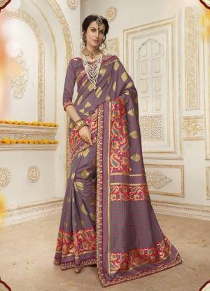 Here Is A Beautiful Saree In grey Color Paired With Grey Colored Blouse. This Saree And Blouse Are Fabricated On Jacquard Silk Beautified With Weave And Lace Border. Buy This Designer Saree Now.