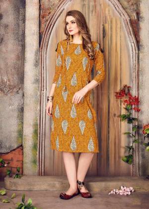 You Will Definitely Earn Lots Of Compliments Wearing This Readymade Kurti In Musturd Yellow Color Fabricated On Cotton Beautified With Prints All Over It. Buy This Kurti Now.