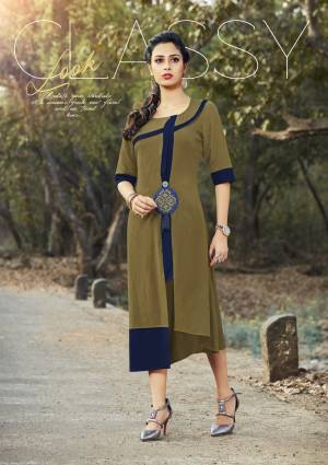 Add This New Shade Of Green To Your Wardrobe With This Readymade Kurti In Olive Green Color Fabricated On Cotton. This Kurti Is Light Weight And Easy To Carry All Day Long.