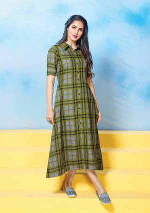 Add This New Color And New Combination To Your Wardrobe With This Trendy Designer Readymade Kurti In Olive Green Color. It Is Fabricated On Cotton Beautified with Checks Prints All Over It. 