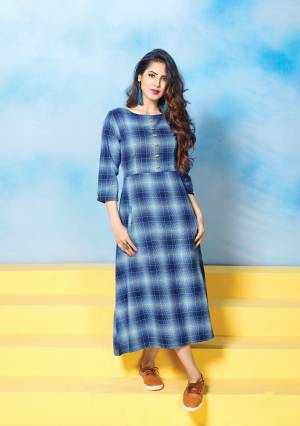 Grab This Pretty Kurti In Blue Color Fabricated On Cotton Beautified With Prints All Over It. This Simple and Elegant looking Kurti Is Comfortable To Wear And Easy To Carry All Day Long.