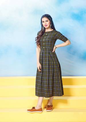 Enhnace Your Beauty Wearing This Designer Readymade Trendy Kurti In Dark Grey Color Fabricated On Cotton. Its Has Beautiful Small And Bold Checks All Over It. Also It Is Available In Many Sizes. Buy Now.