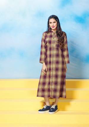 Here Is Very Pretty Wine And Beige Colored Readymade Kurti Fabricated On Cotton. Its Trendy Pattern And Pretty Prints Will Earn You Lots Of Compliments.