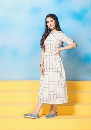 For Your Office, College Or Casual Wear, Grab This Lovely Kurti Suitable For All. This Pretty White Colored Readymade Kurti Is Fabricated On Cotton Simple Checks All Over. Buy It Now.