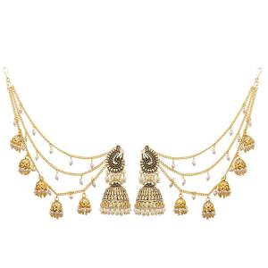Another Jhumka Styled Heavy Earrings Set Is Here In Golden Color. You can Pair This Up With Any Colored Traditonal Attire. These Are Light Weight And Easy To carry Throughout The Gala.