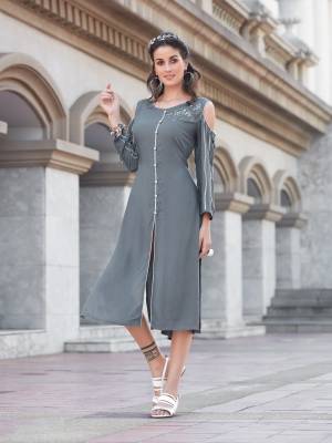 Simple And Elegant Looking Readymade Kurti Is Here In Grey Color Fabricated On Rayon Cotton Beautified With Thread Work. This Kurti Is Light Weight And Easy To carry All Day Long.