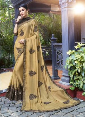 Flaunt Your Rich And Elegant Taste Wearing This Saree In Beige Color Paired With Dark Brown Colored Blouse. This Saree Is Fabricated On Chiffon Paired With Art Silk Fabricated Blouse. This Saree Is Light In Weight And Easy To Carry All Day Long. Buy Now.