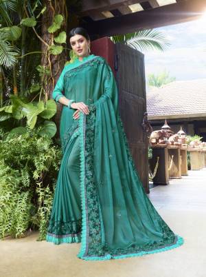 Pretty Shade Of Blue Is Here With This Saree In Turquoise Blue Color Paired With Turquoise Blue Colored Blouse. This Saree Is Fabricated On Chiffon Silk Paired With Art Silk Fabricated Blouse. It Is Beautified with Tone To Tone Embroidery All Over.