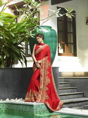 Adorn The Pretty Angelic Look Wearing This Deisgner Saree In Red Color Pauired With Red Colored Blouse. This Saree Is Fabricated On Chiffon Silk Paired With Art Silk Fabricated Blouse. It Has Attractive Embroidery Over the Saree. Buy Now.