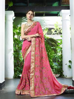 Look Pretty In This Designer Pink Colored Saree Paired With Beige Colored Blouse. This Saree Is Fabricated On Chiffon Silk Paired With Art Silk Fabricated Blouse. It Has Multi Colored Embroidery Over The Saree.