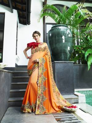 Orange And Red Color Induces Perfect Summery Appeal To Any Outfit, So Grab This Saree In Orange Color Paired With Contrasting Red Colored Blouse. This Saree Is Fabricated On Chiffon Silk Paired With Art Silk Fabricated Blouse. It Is Beautified With Embroidery All Over It. Buy This Designer Saree Now.