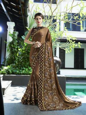 Flaunt Your Rich And Elegant Taste Wearing This Designer Saree In Brown Color Paired With Brown Colored Blouse, This Saree Is Fabricated On Georgette Paired With Art Silk Fabricated Blouse. Both Its Fabrics Ensures Superb Comfort Throughout The Gala. Buy Now.