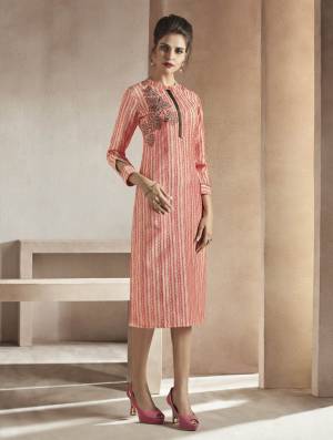 New And Unique Kurti Is Here With Mix And Match Of Prints And Thread Work. This Kurti Is In Peach Color Fabricated On Soft Modal. It Is Available In Many Sizes And Also Ensures Superb Comfort All Day Long.