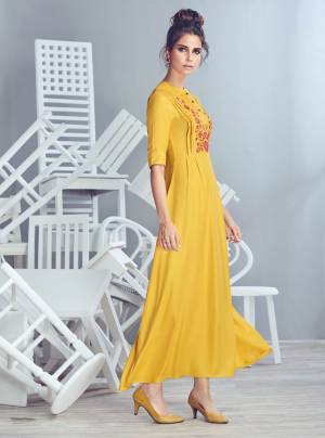This Summer Beat The Heat With Bright Fresh Colors Wearing This Readymade Kurti In Yellow Color Fabricated On Crepe Georgette. It Has Pretty Thread Work Motif Over The Yoke. Buy This Kurti Now.