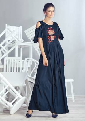 Here Is A Designer Kurti With Cold Shoulder Pattern In Navy Blue Color Fabricated On Crepe Georgette. It Is Also Beautified With Thread Work Motif. Its Fabric Is Soft Towards Skin And Easy To Carry All Day Long.