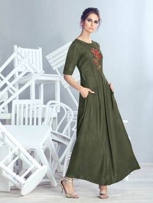 A Must Have Color In Every Womens Wardrobe Is Here With This Designer Kurti In Olive Green Color Fabricated On Crepe Georgette Beautified With Thread Work. This Readymade Kurti Is Availabe In Many Sizes And Also It Is Soft Towards Skin Which Is Easy To Carry For Long.