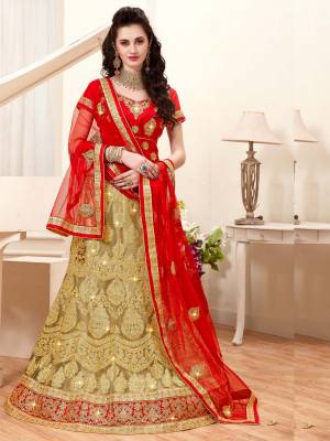Celebrate The Upcoming Festive And Wedding Season with This Designer Lehenga Choli In Red Colored Blouse Paired With Beige Colored Lehenga And Red Colored Dupatta. This Lehenga Choli Is Beautified With Heavy Embroidery Which Will Give An Attractive Look Also It Is Easy To Carry Throughout The Gala. Buy Now.