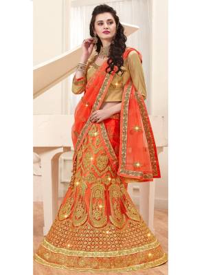 Orange Color Induces Perfect Summery Appeal To Any Outfit, So Grab This Designer Lehenga Choli In Golden Colored Blouse Paired With Orange Colored Lehenga And Dupatta. Its Blouse Is Fabricate On Gota Paired With Net Fabricated Lehenga And Dupatta. It Has Heavy Jari Embroidery All Over.  Buy Now.