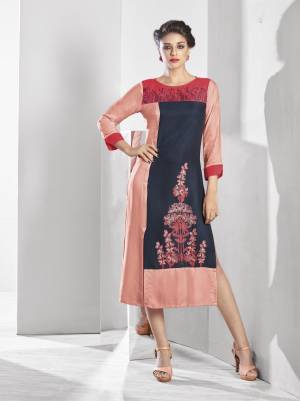 Peach & Grey  Color Modal Fabric Kurti. This kurti has beautiful thread work at neck line with floral embroidered on front of the kurti, Pair it with contrast leggings and sandals to get complimented for your classy choice.