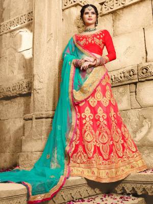 Shine Bright Wearing this Designer Lehenga Choli In Dark Pink Color Paired With Contrasting Turquoise Blue Colored Dupatta. Its Blouse Is Fabricated On Art Silk Paired With Net Fabricated Lehenga And Dupatta. Buy This Designer Lehenga Choli Now.