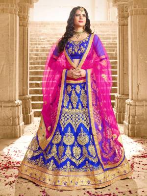 For An Attractive Look Grab This Designer Lehenga Choli In Royal Blue Color Paired With Contrasting Rani Pink Colored Dupatta. Its Blouse Is Fabricated On Art Silk Paired With Net Fabricated Lehenga And Dupatta. This Lehenga Choli Is Light Weight And Easy To Carry Throughout The Gala.