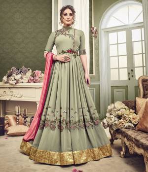 Flaunt Your Rich And Elegant Taste Wearing This Designer Floor Length Suit In New Mint Green Colored Top Paired With Mint Green Colored Bottom And Contrasting Pink Colored Dupatta. Its Top Is Fabricated On Georgette Paired With Santoon Bottom And Chiffon Dupatta. This Suit Has Contrasting Embroidery Which Is Giving An Attractive Look To The Whole Attire.