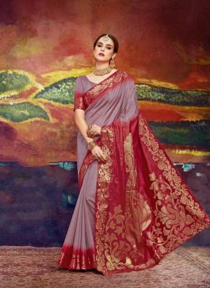 Add This New And Pretty Sahde To Your Wardrobe Wearing This Saree In Mauve And Red Color Paired With Mauve Colored Blouse. This Saree And Blouse are fabricated On Nylon Art Silk Beautified With Weave. This saree Is Light Weight, Soft Towards Skin And Easy To carry All Day Long.