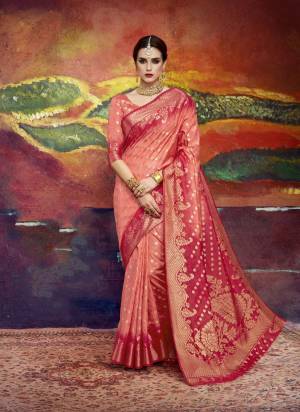 A Must Have Shade In Every Womens Wardrobe Is Here, Grab This Lovely Peach And Red Colored Saree Paired With Peach Colored Blouse. This saree And Blouse Are Fabricated On Nylon Art Silk Beautified With Weave All Over. Buy Now.