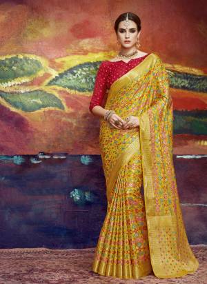 Celebrate This Festive Season Wearing This Saree In Yellow Color Paired With Contrasting Red Colored Blouse. This Saree And Blouse Are Fabricated On Nylon Art Silk Beautified With Weave All Over. It Is Light Weight And Easy To carry All Day Long.