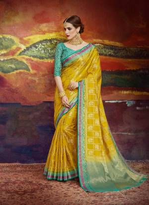 Celebrate This Festive Season Wearing This Saree In Yellow Color Paired With Contrasting Sea Green Blouse. This Saree And Blouse Are Fabricated On Nylon Art Silk Beautified With Weave All Over. It Is Light Weight And Easy To carry All Day Long.