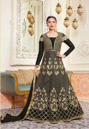 Enhance Your Beauty Wearing This Designer Floor Length Suit In Black Color Paired With Black Colored Bottom And Dupatta. Its Top Is Fabricated On Art Silk Paired With Santoon Bottom And Chiffon Dupatta. It Has Heavy Embroidery All Over It. Buy Now.