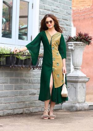 New And Unique Sleeve Pattern Is Here With This Trendy Kurti In Dark Green Color Fabricated On Georgette Beautified With Thread Work. This Kurti Is Light Weight And Easy To Carry All Day Long.