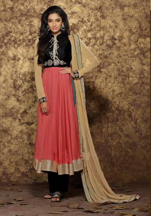 New Combination Is Here With This Semi-Stitched Suit In Black And Peach Colored Top Paired With Black Colored Bottom And Beige Colored Dupatta. Its Top Is Fabricated On Art Silk And Modal Paired With Cotton Bottom And Chiffon Dupatta. Buy This Suit Now.