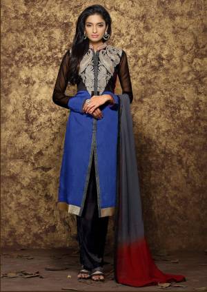 Here Is An Attractive Colored Suit In Blue And Black Color Paired With Black Colored Bottom And Grey And Red Dupatta. It Top Is Fabricated On Cotton Paired With Cotton Bottom And Chiffon Dupatta. It Is Light Weight And Easy To Carry All Day Long.