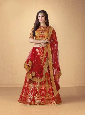 For A Proper Traditonal Look, Grab This Designer Lehenga Choli In Traditonal Color Combination With This Musturd Yellow Colored Blouse Paired With Red Colored Lehenga And Dupatta. Its Blouse And Lehenga Are Fabricated On Art Silk Paired With Net Fabricated Dupatta. Buy Now.