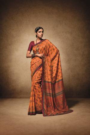 Beat The Heat This Summer Wearing Bright And Pretty Colored Saree In Orange Paired With Contrasting Maroon Colored Blouse. This Saree Is Fabricated On Tussar Art Silk Paired With Art Silk Fabricated Blouse. Buy This Saree Now.
