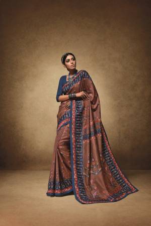Flaunt Your Rich And Elegant Taste Wearing This Saree In Brown Color Paired With Contrasting Blue Colored Blouse, This Saree Is Fabricated On Tussar Art Silk Paired With Art Silk Fabricated Blouse. This Saree Will Definitely Earn You Lots Of Compliments From Onlookers. Buy Now.