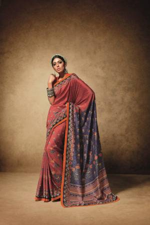 Adorn The Pretty Angelic Look Wearing This Saree In Red And Blue Color Paired With Contrasting Orange Colored Blouse. This Saree Is Fabricated On Tussar Art Silk Paired With Art Silk Fabricated Blouse. It Is Durable And Easy To Care For.