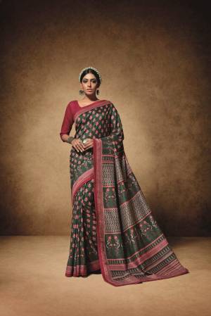 Enhance Your Personality Wearing This Bold Colored Saree In Pine Green Paired With Contrasting Dark Pink Colored Blouse. This Saree Is Fabricated On Tussar Art Silk Paired With Art Silk Fabricated Blouse. Buy This Pretty Saree Now.